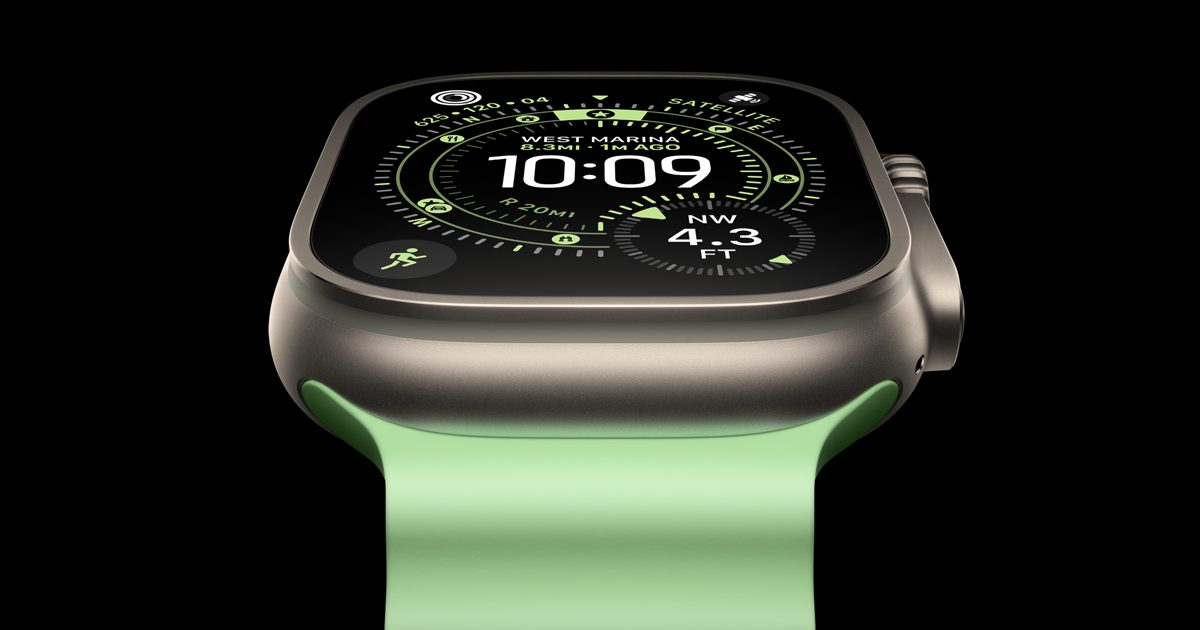 Apple Watch Ultra 3 with titanium case and green band showing the watch face