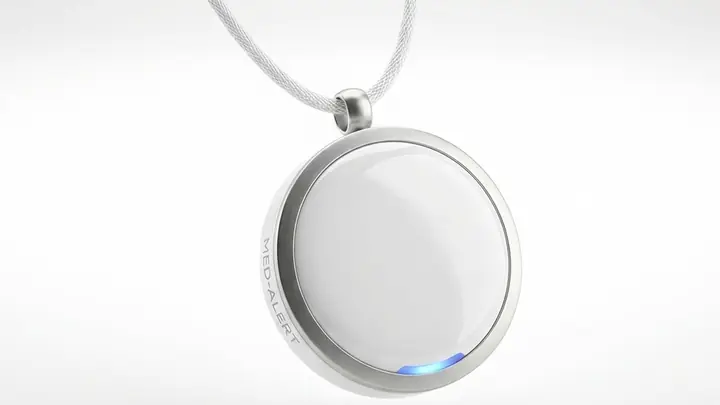 A white pendant alarm on a cord